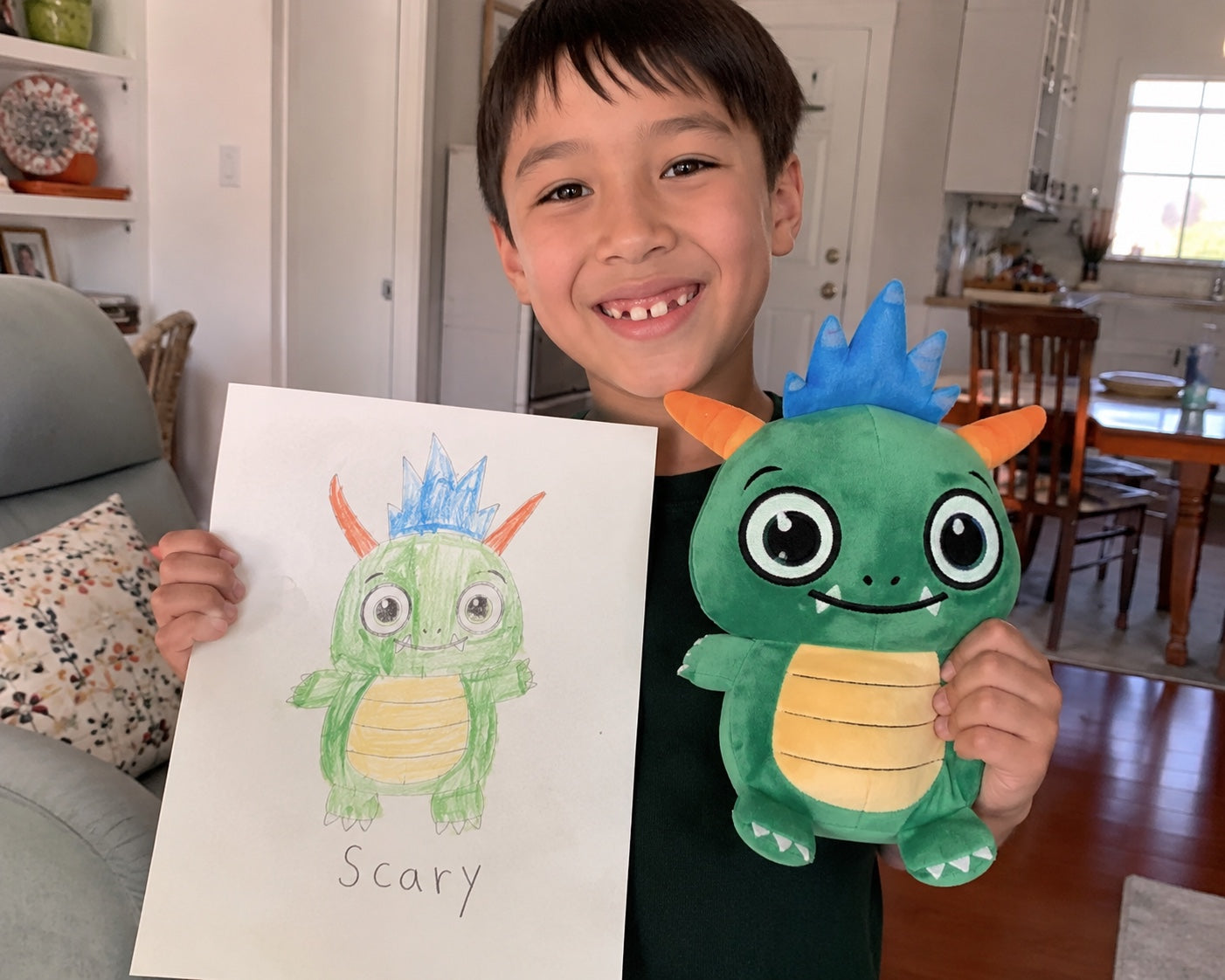 Child holds their crayon drawing next to the finished custom plush — JollyAnime turns your art into reality